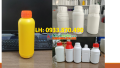 Vỏ chai nhựa 0.5 lít đựng dung dịch thí nghiệm, chai nhựa tròn 1 lít đựng chất phân hủy hàng hóa